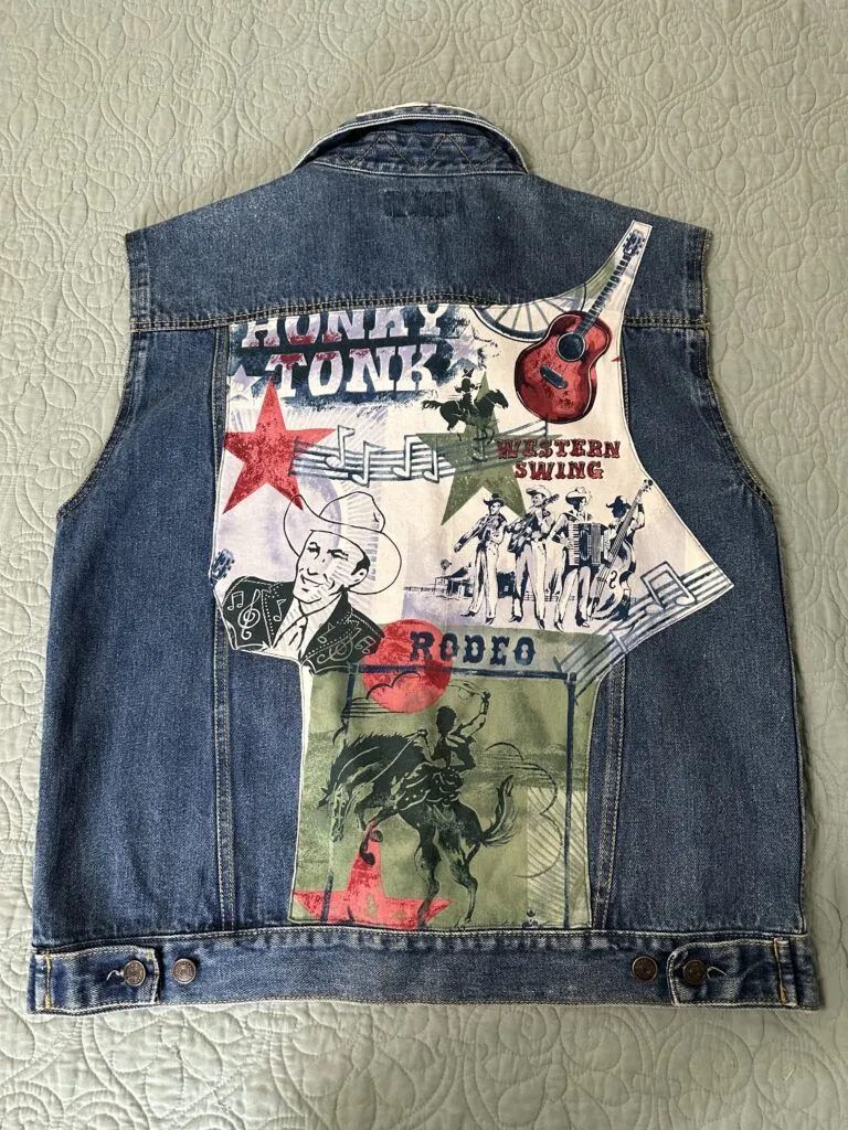 Upcycled denim vest embellished w/vintage Alexander Henry Honky Tonk fabric